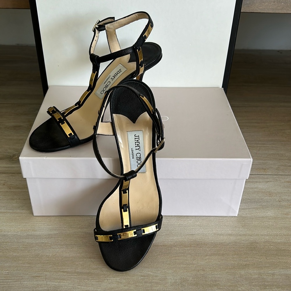 Jimmy Choo black and gold t-strap heels